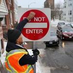 Workers installed new ?Do Not Enter? signs on South Boston streets in February.