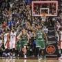 Boston Celtics' Marcus Smart (36) turns to celebrate after scoring the winning basket at the overtime buzzer of an NBA basketball game Saturday, April 4, 2015, in Toronto. The Celtics won 117-116. (AP Photo/The Canadian Press, Chris Young)
