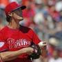 Philadelphia Phillies starting pitcher Cole Hamels reacts on the mound in a spring training baseball game in Clearwater, Fla., Monday, March 16, 2015. Hamels allowed five runs in two innings. (AP Photo/Kathy Willens)