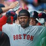 Hanley Ramirez flexes his muscles in the dugout after his ninth-inning grand slam.