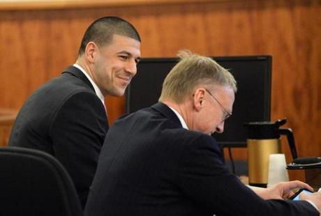 Aaron Hernandez smiled at defense attorney Charles Rankin in the courtroom Wednesday.
