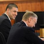 Aaron Hernandez smiled at defense attorney Charles Rankin in the courtroom Wednesday.