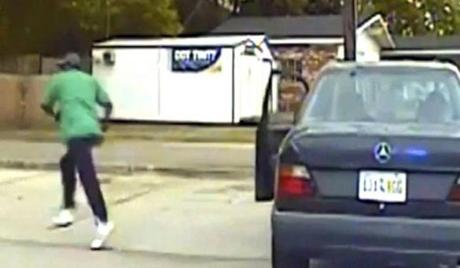 A screen capture from a police dashcam video reportedly shows Walter Scott as he starts to run from North Charleston Officer Michael Slager during a traffic stop.

