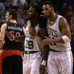 Jae Crowder was embraced by guard Evan Turner  after Crowder drained a three pointer with :03 left on the clock.