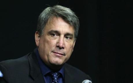 Boston Bruins president Cam Neely answers a reporter's question a news conference in Boston, Tuesday, May 20, 2014. The Bruins were eliminated from the NHL hockey playoffs by the Montreal Canadiens. (AP Photo/Charles Krupa)
