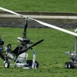 A member of a bomb squad checked out the gyrocopter that Doug Hughes landed on the Capitol?s West Lawn Wednesday.