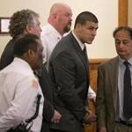 Aaron Hernandez listened as he was sentenced to life in prison for the murder of Odin Lloyd.