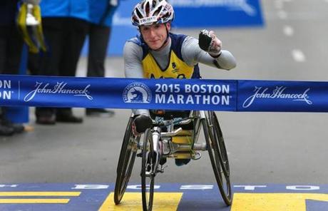 Women's wheelchair winner Tatyana McFadden crossed the  finish line.
