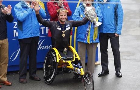 Marcel Hug celebrated after winning the men's wheelchair division.
