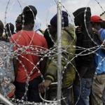 Foreign nationals queued for food at a temporary refugee camp east of Johannesburg, South Africa, on Monday, amid a rash of anti-immigrant attacks.