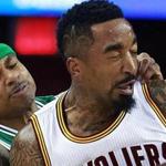 04/21/15: Cleveland, OH: The Cavaliers J.R.Smith slams into the Celtics Isaiah Thomas as he was shooting a first half three pointer. The foul sent Thomas to the line for three shots, and Smith sprawling to the floor as he was hit in the eye on the play. The Boston Celtics visited the Cleveland Cavaliers for Game Two of their opening round NBA Playoff series at Quicken Loans Arena. (Globe Staff Photo/Jim Davis) section: sports topic: Celtics-Cavaliers (1)