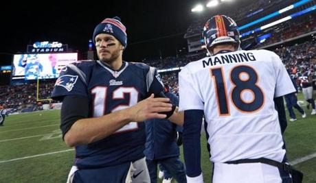 Tom Brady and Peyton Manning will be meeting in prime time again in 2015, this time at Denver in Week 12. (File/Jim Davis/Globe Staff) 

