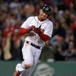 Mookie Betts gives himself a hand after driving in the winning run in the ninth inning on Monday night.