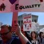 Hundreds of proponents and opponents of same-sex marriage made their views known outside the Supreme Court Tuesday. A ruling from the justices is expected in June.
