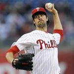 Philadelphia Phillies starting pitcher Cole Hamels throws a pitch during the first inning of a baseball game against the Washington Nationals, Saturday, April 11, 2015, in Philadelphia. (AP Photo/Michael Perez)