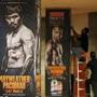 Workers install signs for the bout between Floyd Mayweather Jr. and Manny Pacquiao scheduled for Saturday.