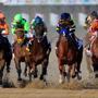 LOUISVILLE, KY - MAY 03: The field comes out of the starter's gate to start the 140th running of the Kentucky Derby at Churchill Downs on May 3, 2014 in Louisville, Kentucky. (Photo by Rob Carr/Getty Images)