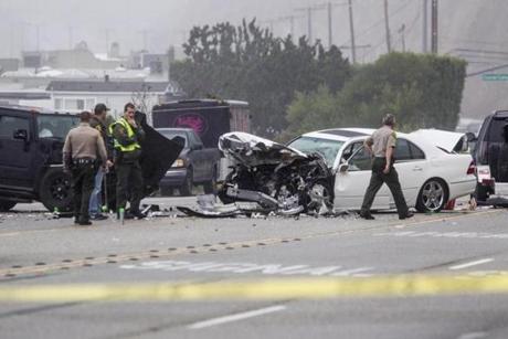Officials investigated the crash scene in Malibu, Calif.
