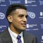 One AFC scout compares Titans first-round pick Marcus Mariota to NFl quarterbacks Colin Kaepernick and Ryan Tannehill. (Mark Humphrey/AP)
