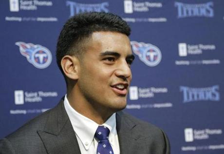 One AFC scout compares Titans first-round pick Marcus Mariota to NFL quarterbacks Colin Kaepernick and Ryan Tannehill.
