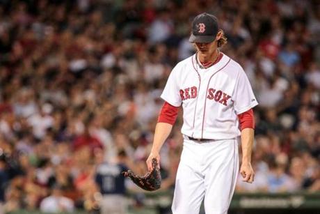 05/04/2015 BOSTON, MA Red Sox pitcher Clay Buchholz (cq) walked off the field after allowing 4 runs in the first 2 innings during a game between the Boston Red Sox and the Tampa Bay Rays at Fenway Park in Boston. (Aram Boghosian for The Boston Globe) 
