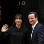 British Prime Minister David Cameron and his wife, Samantha, returned to the prime minister?s residence Friday.
