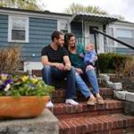 Four years and a lot of paperwork later, Liz and Chris Stuart (pictured with children Harper, 5 months, and Leighton, 3) purchased their Braintree home. 
