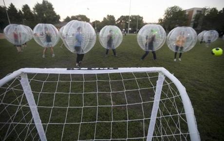 Players compete in the Chicago Bubble Soccer league.
