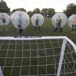Players compete in the Chicago Bubble Soccer league.