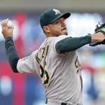 Oakland Athletics' Scott Kazmir works against the Boston Red Sox in the first inning of a baseball game Monday, May 11, 2015, in Oakland, Calif. (AP Photo/Ben Margot)