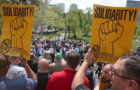 MBTA union workers rallied on the Boston Common on Monday.
