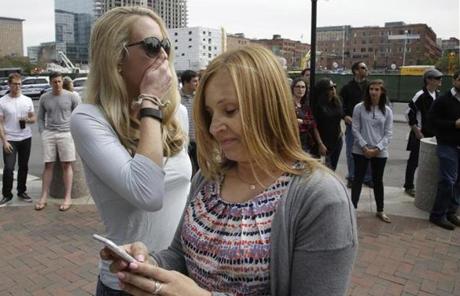 Karen Snyder (right) and Kathryn Vanwie reacted to the announcement of the death penalty verdictoutside the courthouse.
