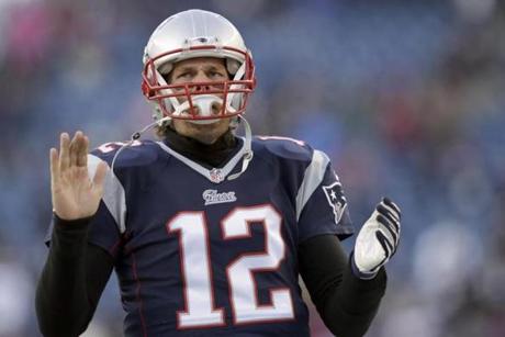 New England Patriots quarterback Tom Brady shouts as he takes the field before an NFL divisional playoff football game against the Baltimore Ravens Saturday, Jan. 10, 2015, in Foxborough, Mass. (AP Photo/Charles Krupa)

