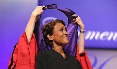 Robin Roberts, co-anchor of ABC's Good Morning America, was hooded by Michaele Whelan before giving the commencement address at Emerson College.
