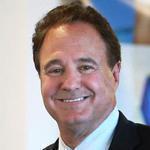 Steve Pagliuca is expected to setawarmer tone as he replaces John Fish, a construction magnate.