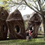 Artist Patrick Dougherty (right) and volunteer Scott Froeschl checked out Dougherty?s ?Stickwork? sculpture in Salem.