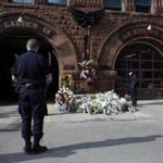 A makeshift memorial was set up outside of the firehouse on Boylston Street in 2014 following a nine-alarm fire that killed two Boston firefighters.  