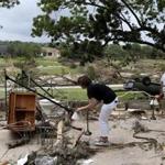 Debi Welsh, of Corpus Christi, Texas, helped clean up the remains of her family home, which washed away, 
