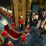  Queen Elizabeth II was accompanied by Prince Philip through the Royal Gallery in the House of Lords.