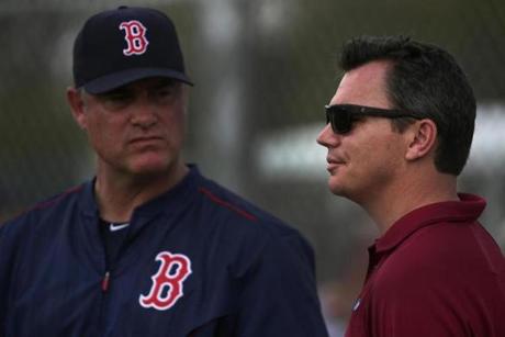 Fort Myers, FL - 03/02/15 - Boston Red Sox manager John Farrell and Red sox General Manager Ben Cherington observe today's workout. Red Sox Spring Training. (Barry Chin/Globe Staff), Section: Sports, Reporter: Peter Abraham, Topic: 03Red Sox, LOID: 8.0.2826364469. 
