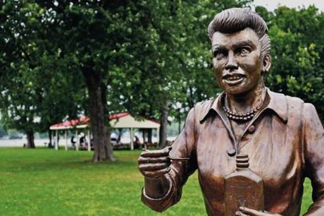 A bronze sculpture of Lucille Ball is displayed in Lucille Ball Memorial Park in the village of Celoron, New York. 
