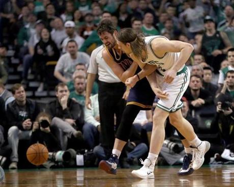 Kevin Love and Kelly Olynyk got tangled going for a rebound during Game 4 of the first round of the playoffs.
