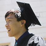 Joey Kim (center) graduated from Harvard in 2015.