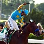 Victor Espinoza reacted after guiding American Pharoah to victory in the Belmont Stakes, capturing the first Triple Crown in 37 years.