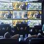 Fans look at multiple screens showing games around the NFL league inside the Jacksonville Jaguars? fantasy football lounge at EverBank Field. Yahoo! will stream the Jaguars? game against the Bills on Oct. 25.