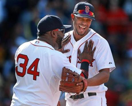 David Ortiz celebrates with Xander Bogaerts (right) after the Red Sox? win.
