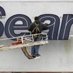 Sears Holdings Corp., the parent of Sears and Kmart, lost $303 million, or $2.85 per share, in its first quarter.