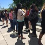 Students waited outside Everest College hoping to get their transcriptions and information on loan forgiveness and transferring credits to other schools. Corinthian Colleges shut down all of its remaining 28 ground campuses in April, displacing 16,000 students.