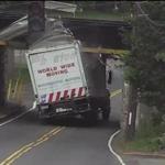 A white moving truck was the latest victim at the East Street bridge in Westwood.