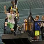 Josh Cohen, 11, stepped off a 20-foot Launch Tower, landing on an air-filled stuntman's bag at Launch Trampoline Park in Watertown.